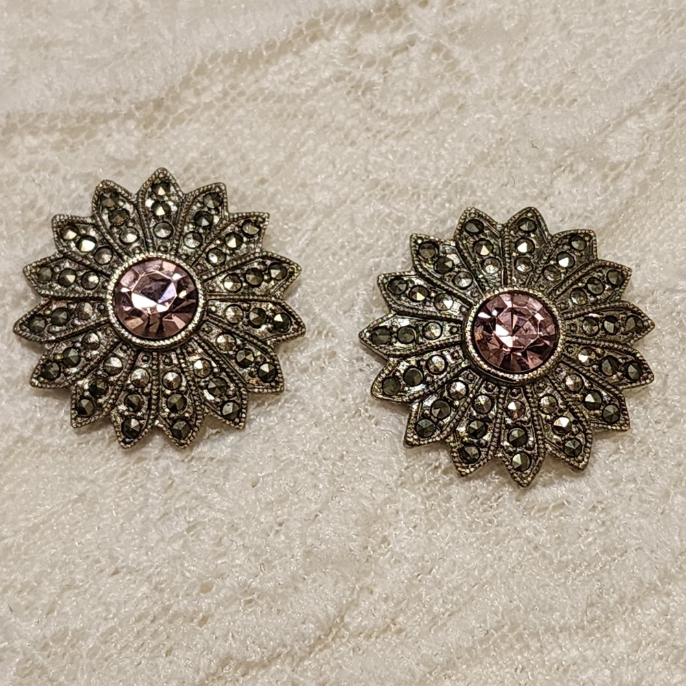 Stunning Floral Silver Toned Pierced Earrings With Pink Center